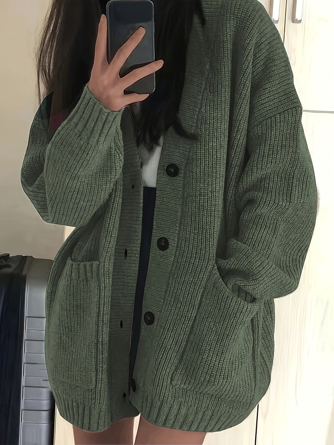 Olive green ribbed knit cardigan with button front and patch pockets