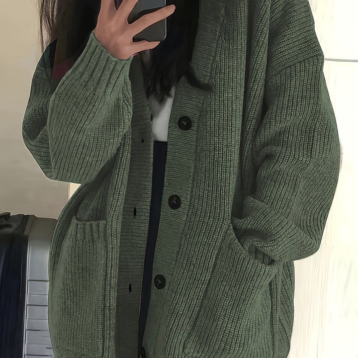 Olive green ribbed cardigan close-up with button placket detail