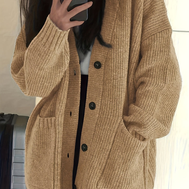 Camel ribbed cardigan close-up showing knit texture and buttons