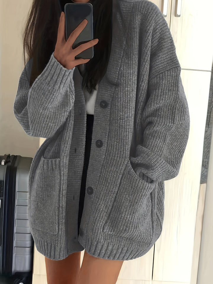 Charcoal gray ribbed cardigan with relaxed fit and buttoned front