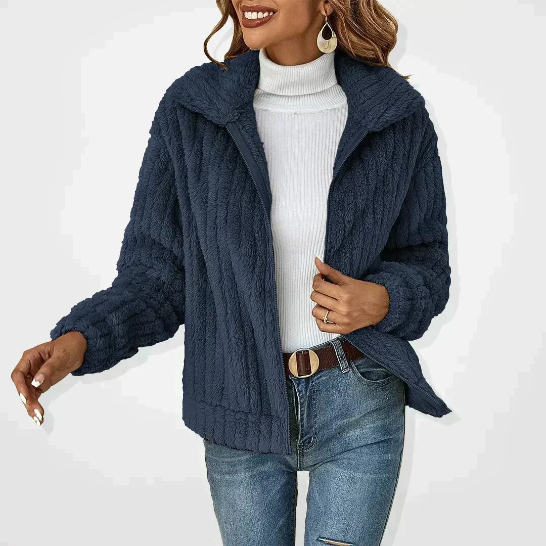 Navy blue textured faux fur jacket with zip front and collared neckline