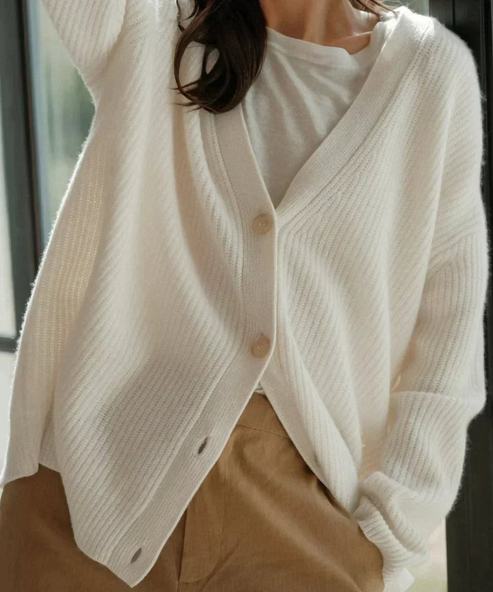 Ivory oversized cashmere cardigan worn open over a white tee
