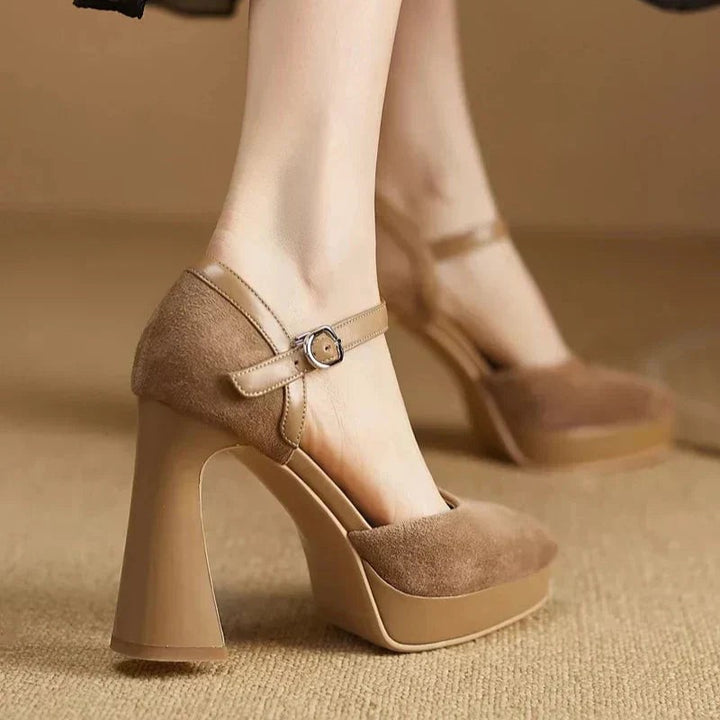 Pointed-toe suede pumps in tan with silver buckle ankle strap