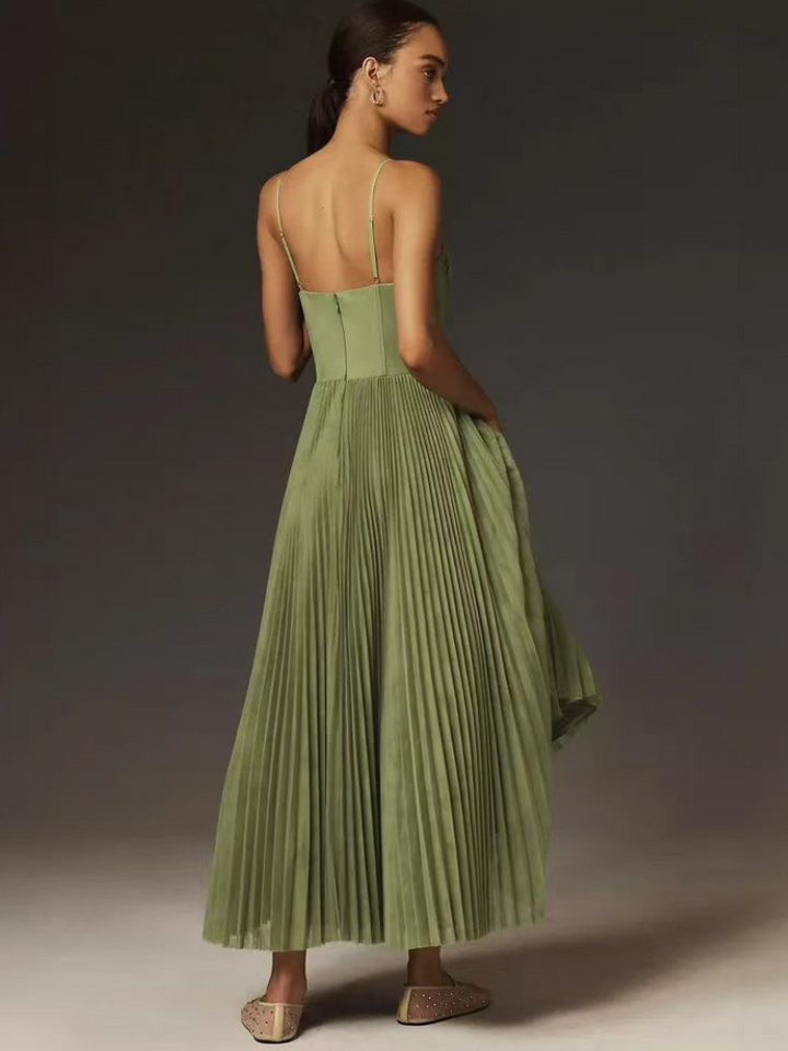 Back view of sage green pleated maxi dress showing thin adjustable straps