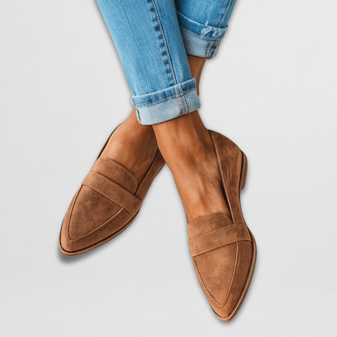 cognac suede pointed-toe loafers with cuffed jeans, penny strap detail
