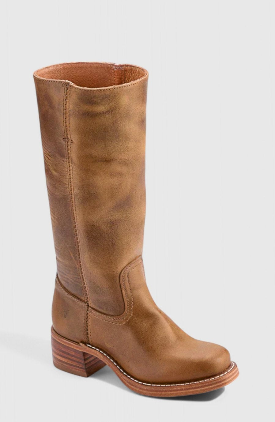 Side view of cognac leather knee-high boot with stacked heel detail