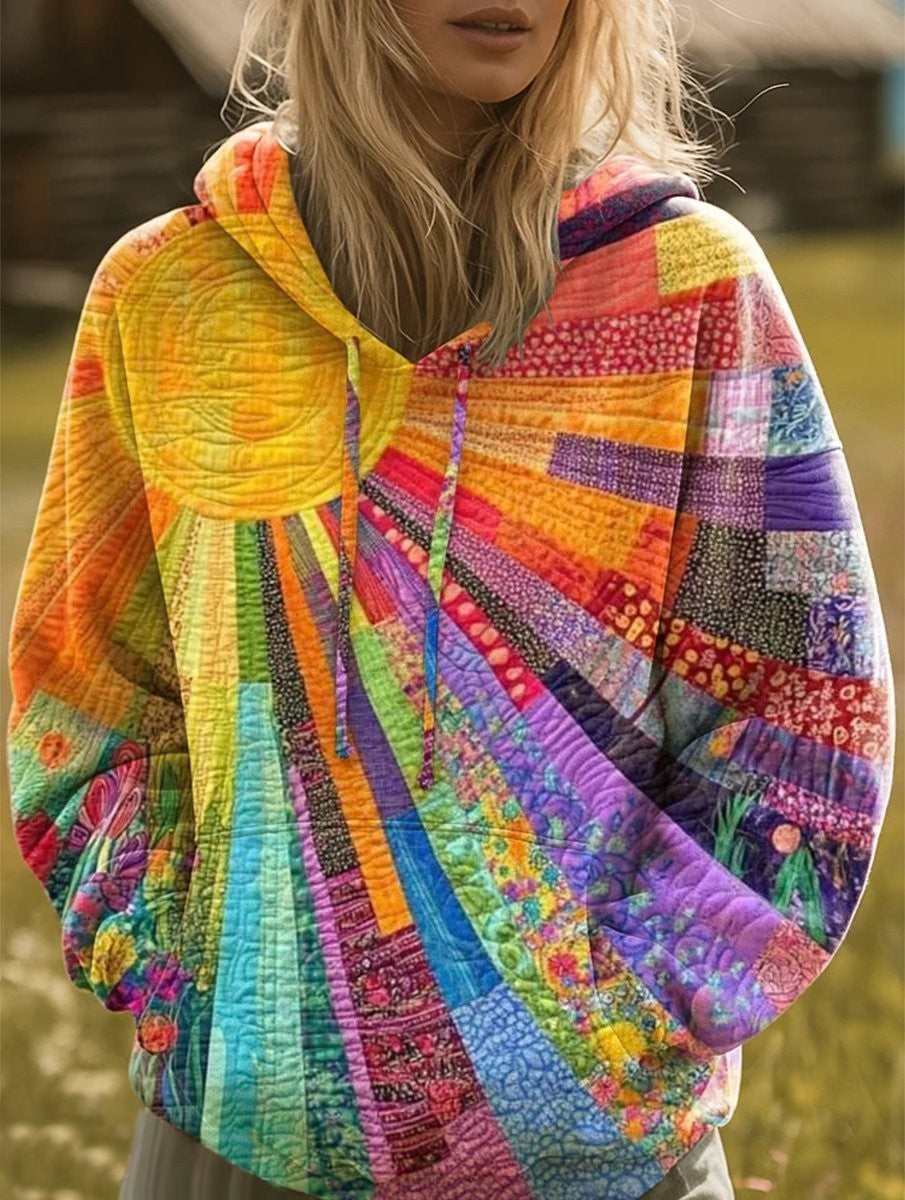 Colorful patchwork quilted pullover hoodie with sunburst print design