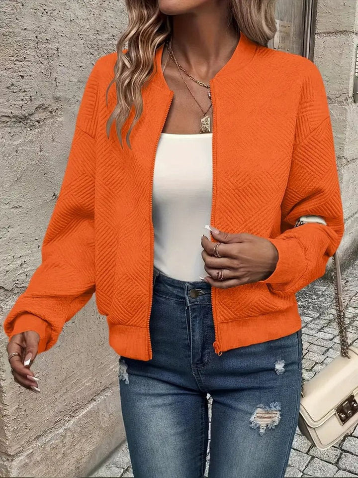 bright orange textured quilted cropped bomber jacket with ribbed hem