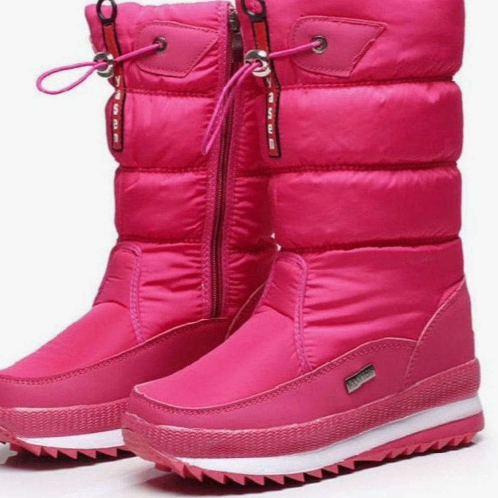 Hot pink quilted mid-calf snow boots with drawstring toggle detail