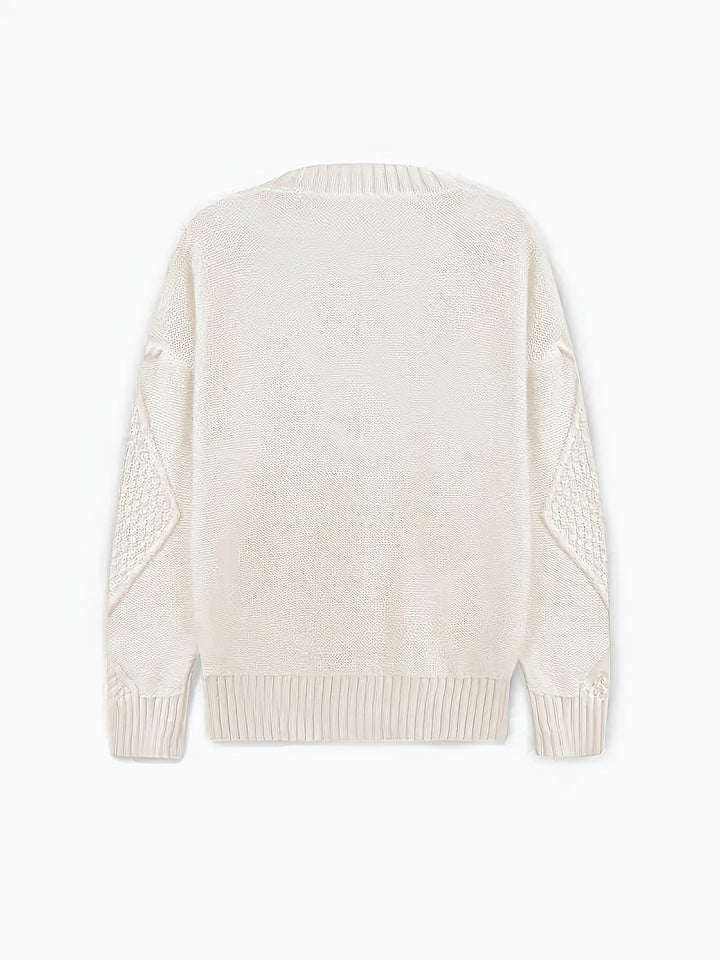 Back view of white cable-knit cardigan with ribbed hem and cuffs