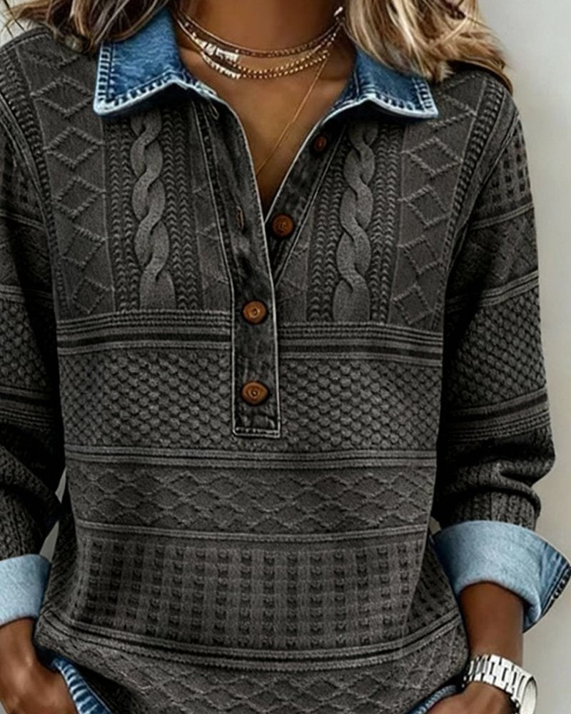Charcoal cable-knit sweater with denim collar, close-up button detail