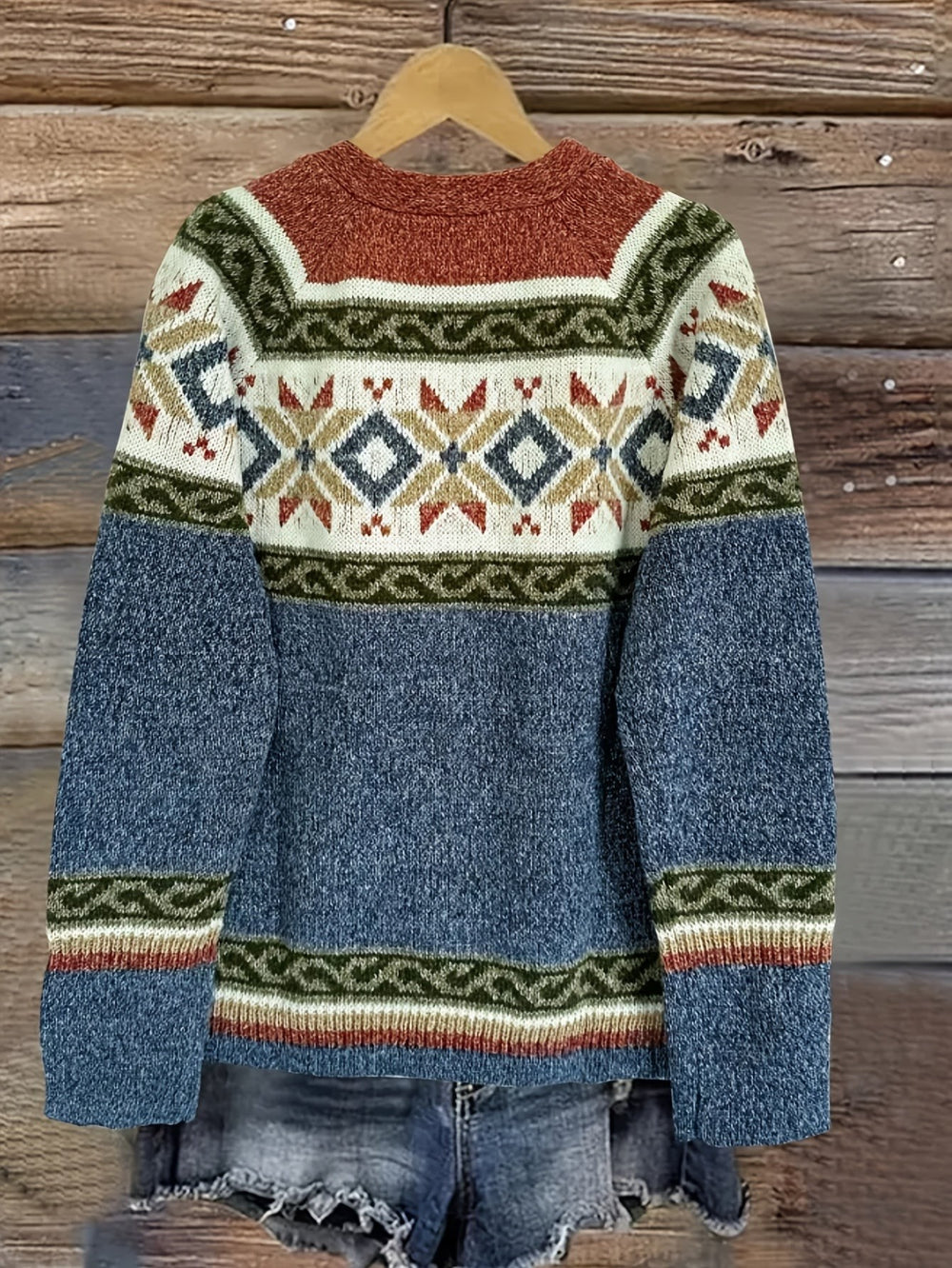 Blue Fair Isle cardigan back view showing rust shoulder and geometric pattern