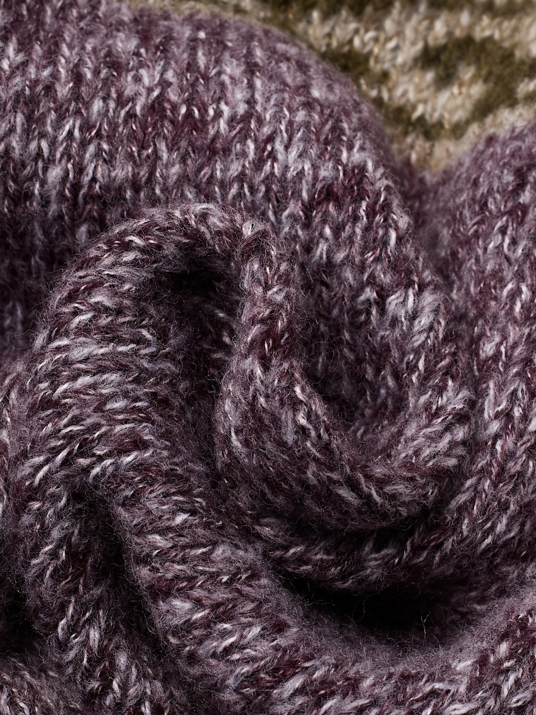 Purple Fair Isle cardigan back view showing rust shoulder detail