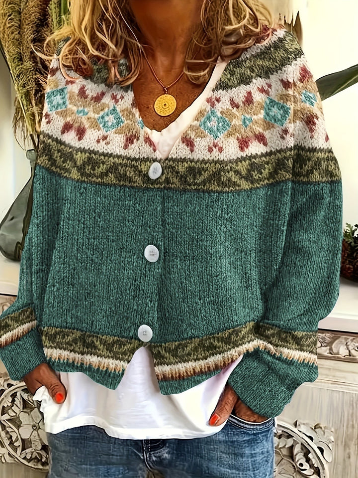Green Fair Isle cardigan worn with denim shorts and layered white top