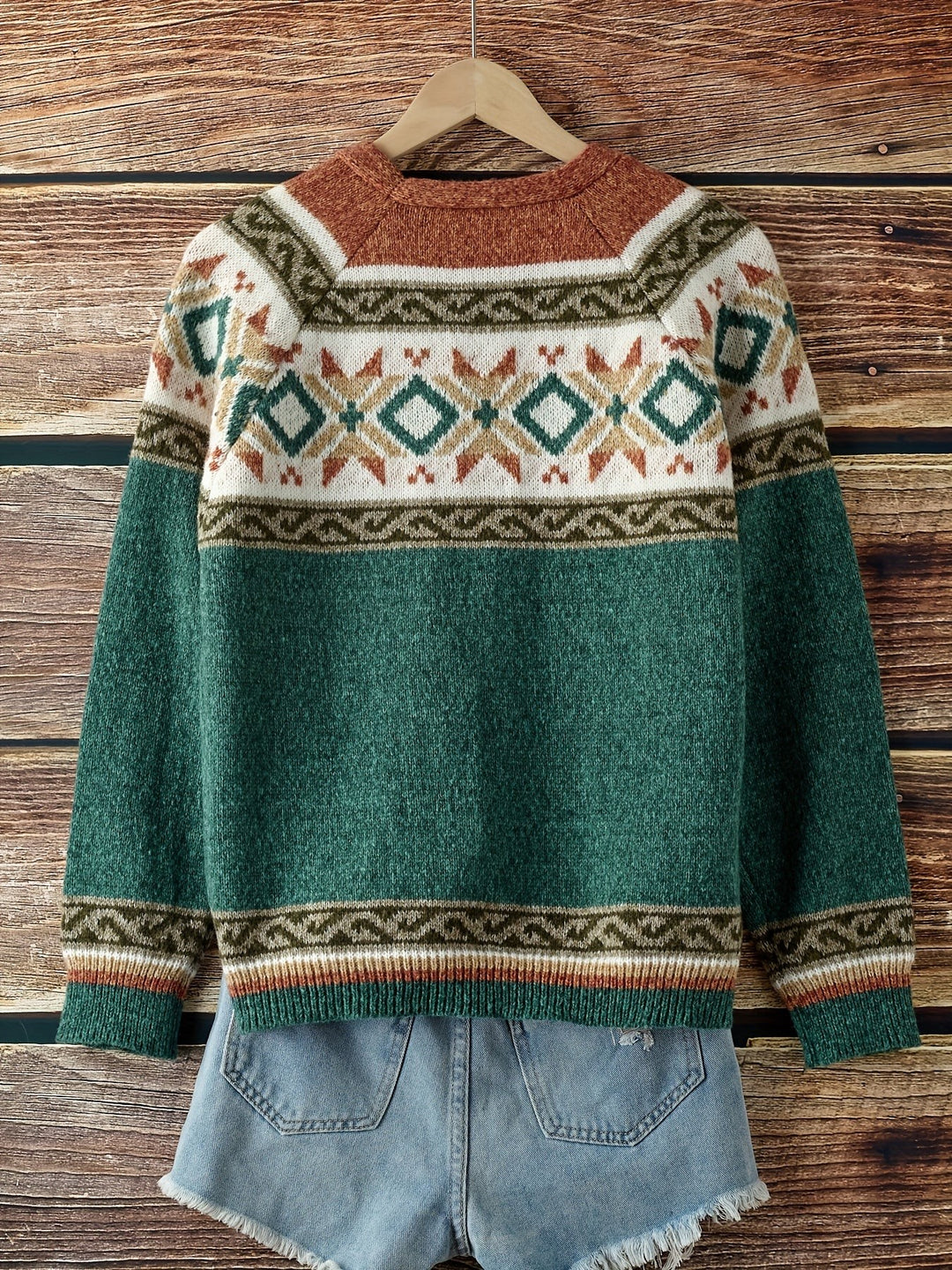 Green Fair Isle cardigan back view showing rust shoulder detail