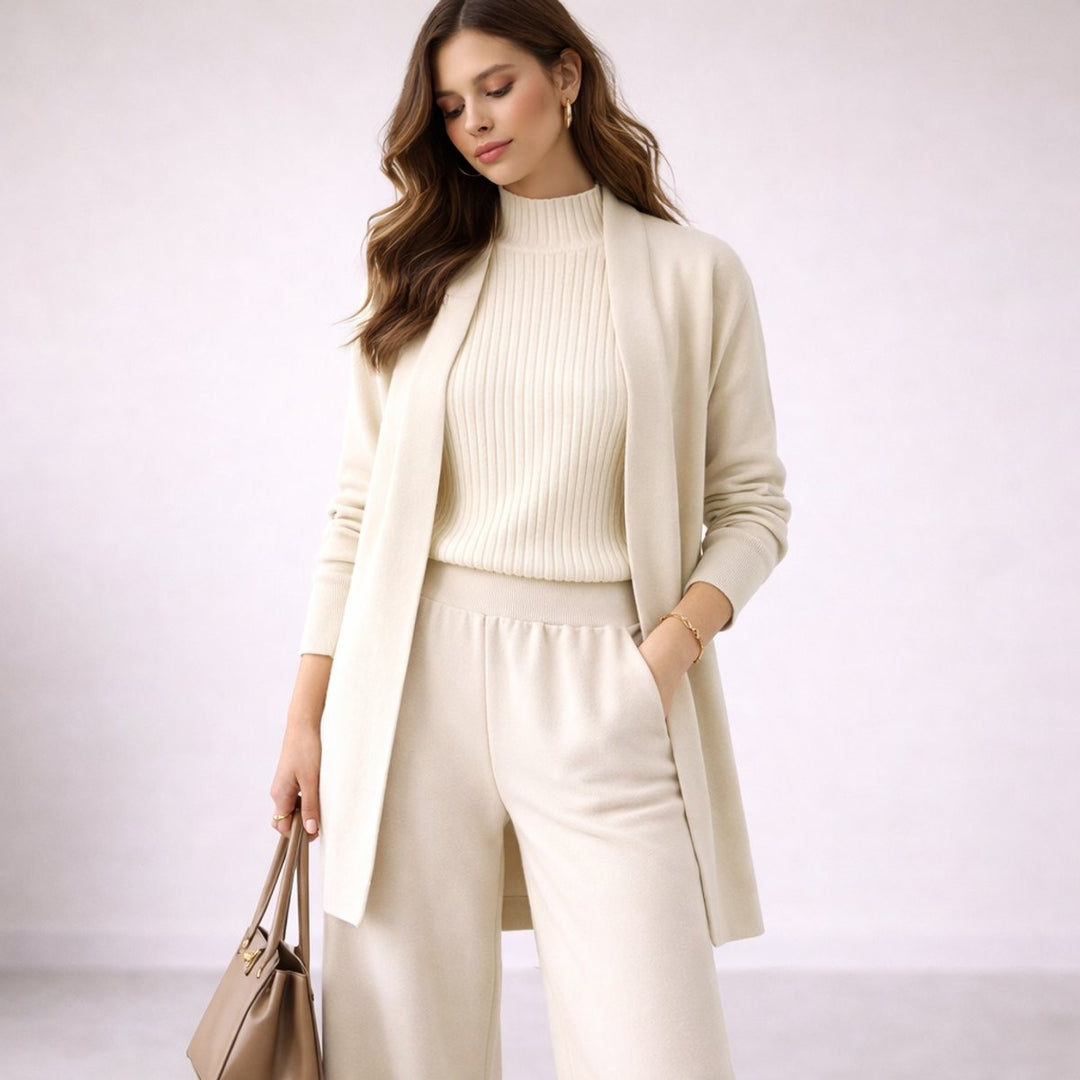 Ivory knit three-piece lounge set with ribbed mock-neck top and longline cardigan