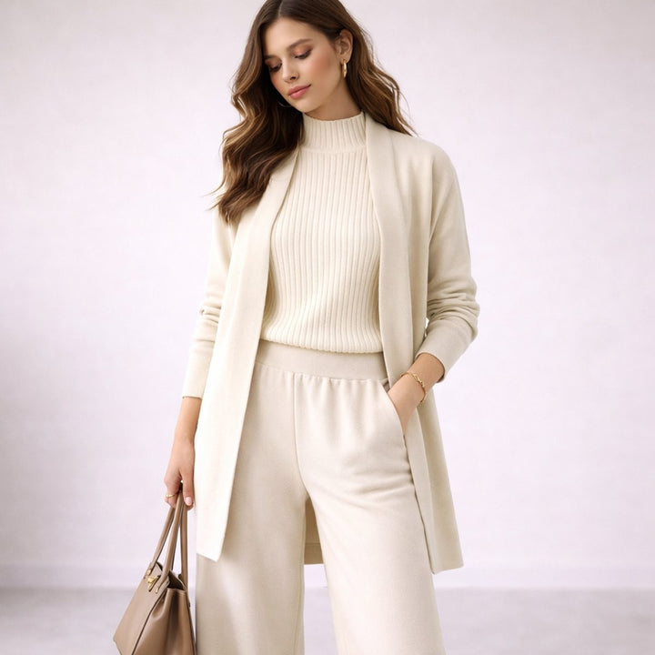 Ivory knit three-piece lounge set with ribbed mock-neck top and longline cardigan
