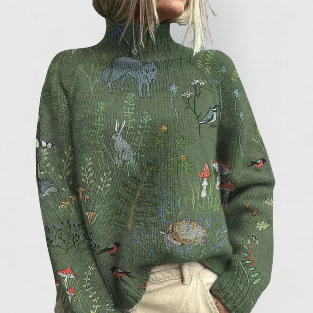 Green woodland print turtleneck sweater featuring forest animals and florals