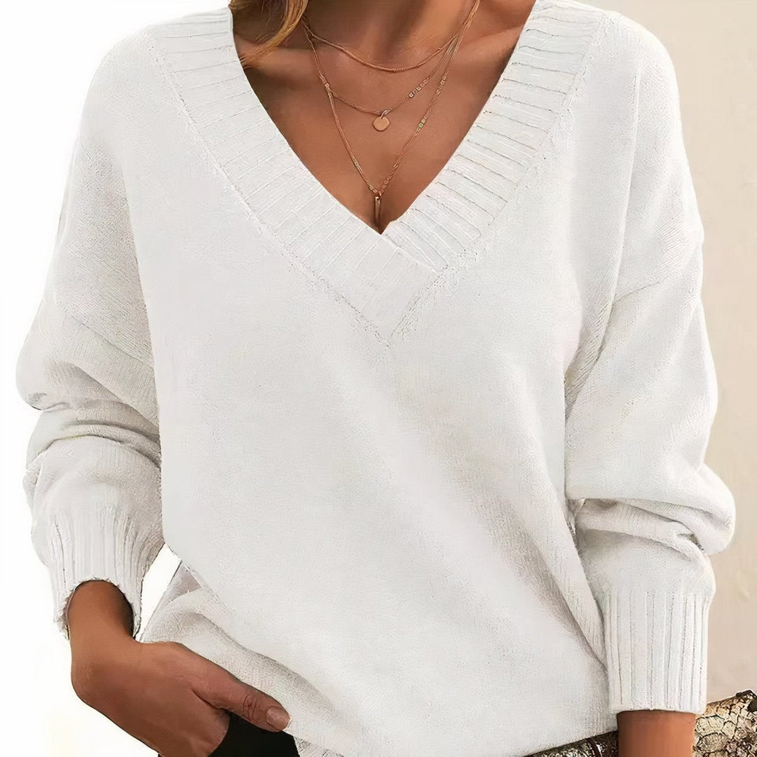 white V-neck knit pullover sweater with ribbed collar and long sleeves