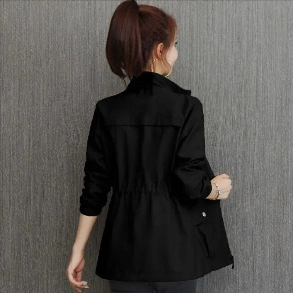 Back view of black lightweight bomber jacket with cinched drawstring waist