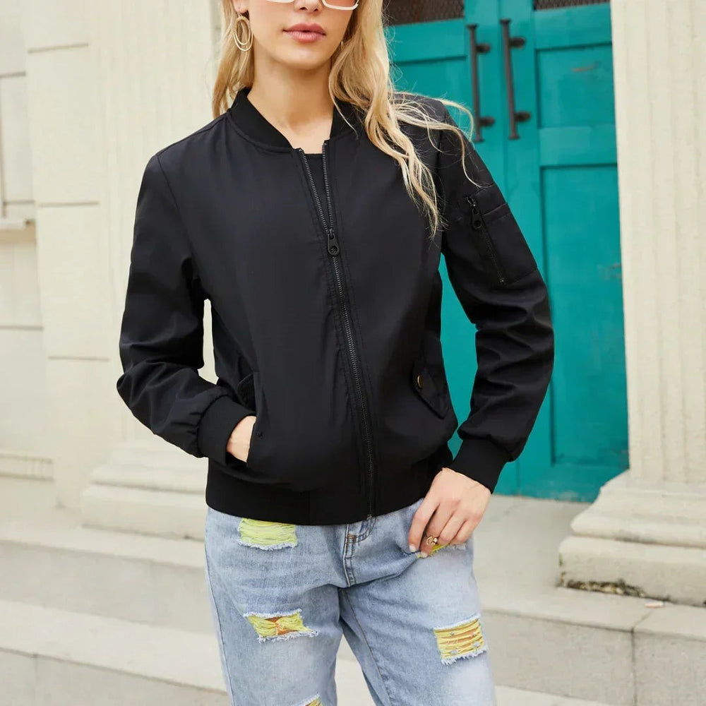 Black zip-up bomber jacket with contrast ribbed collar and cuffs