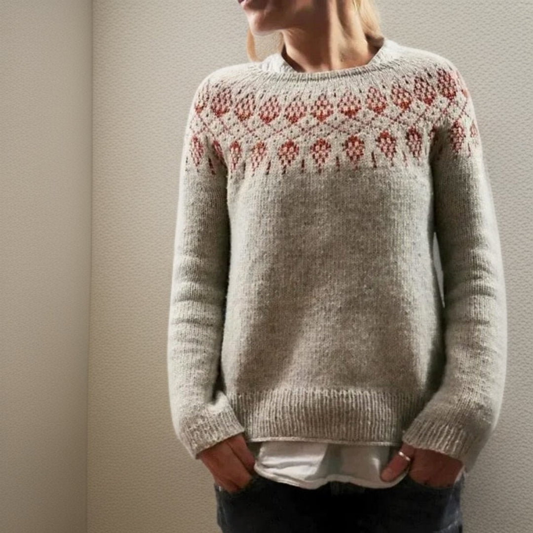 Gray Fair Isle knit sweater with red patterned yoke and crew neckline
