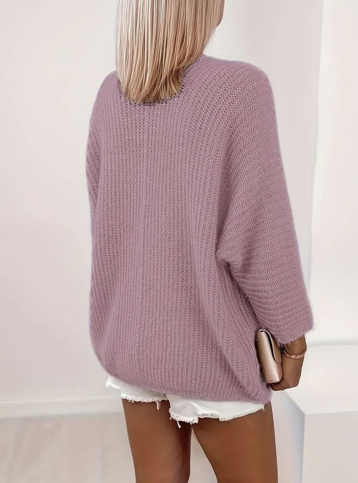 back view of mauve purple oversized knit cardigan with batwing sleeves