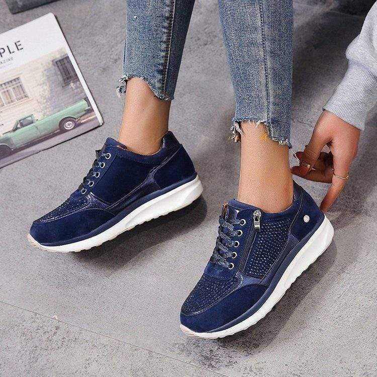 Navy platform sneakers with rhinestone mesh panels and side zipper detail