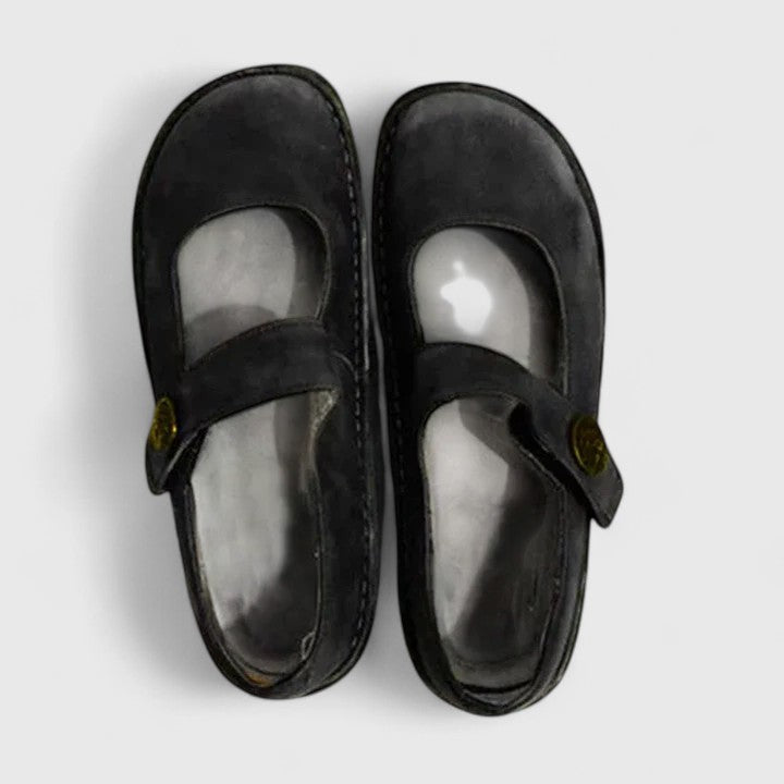 Top view of black suede Mary Jane orthopedic shoes with adjustable strap