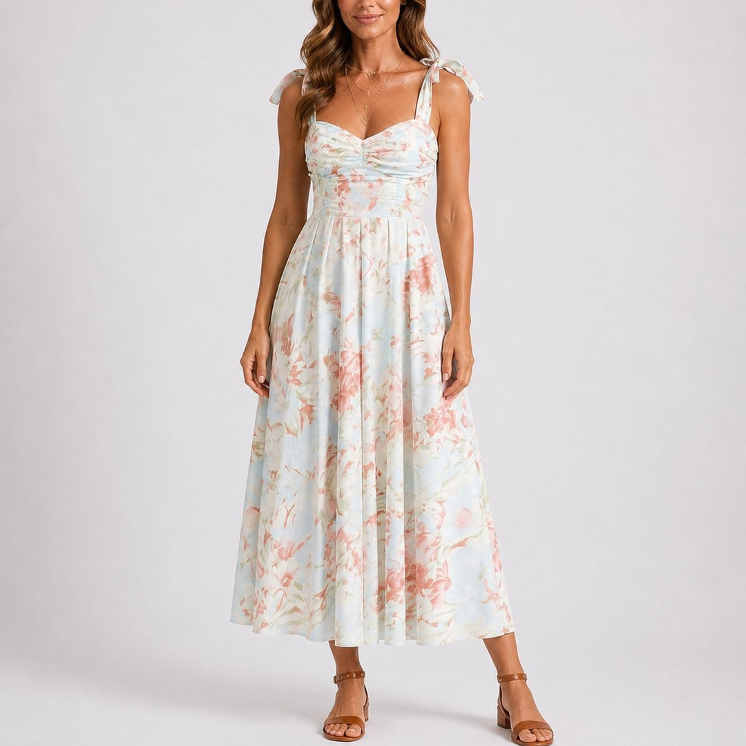 Coral floral midi dress with tie shoulder straps and ruched sweetheart bodice