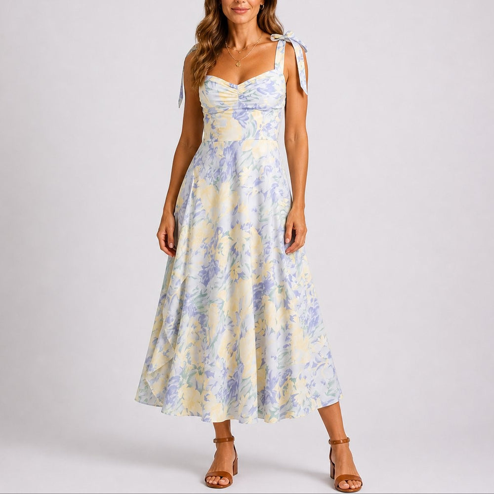 Sky blue floral midi dress with tie-strap shoulders and fitted waist