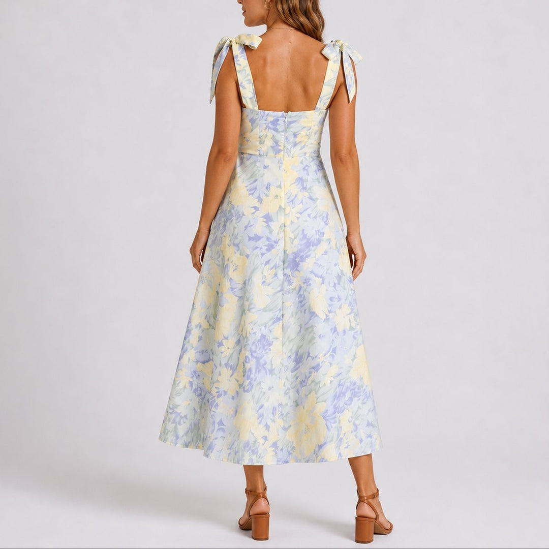 Back view of pastel floral midi dress showing tie straps and open back