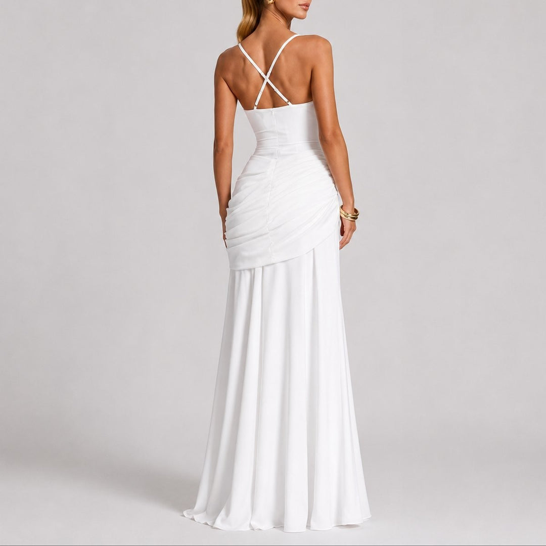 back view of white maxi gown highlighting crisscross back straps