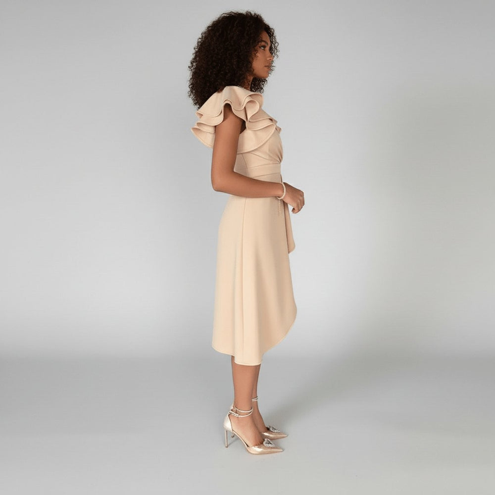 Side view of beige wrap midi dress with ruffled cap sleeves and flowing skirt