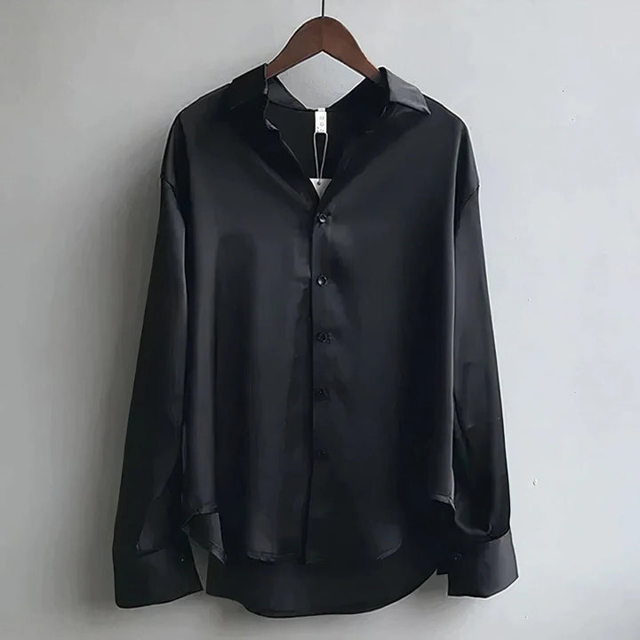 Black satin button-down blouse on hanger, long sleeves with collar