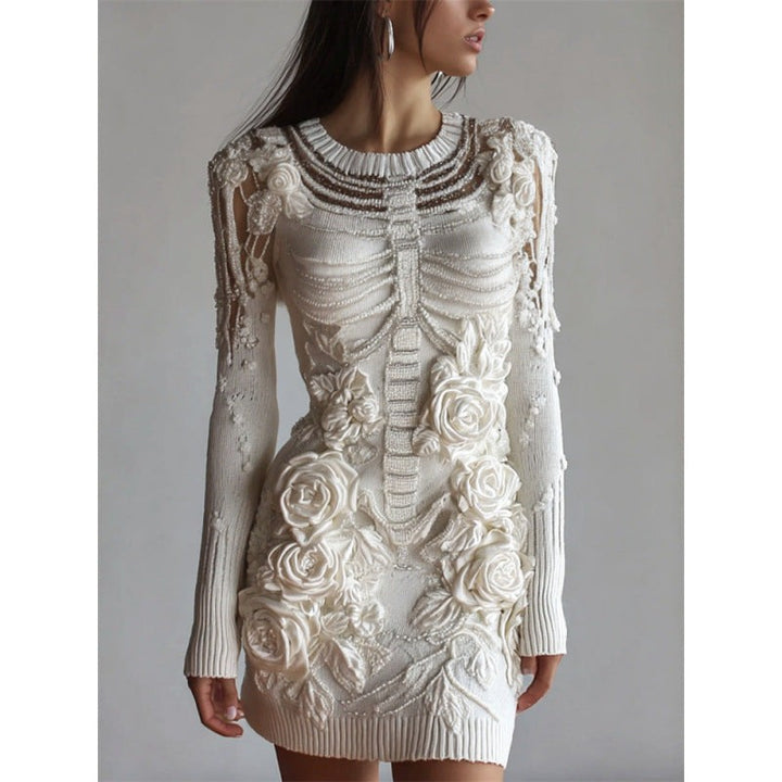Ivory knit mini dress with 3D floral appliques and skeleton motif