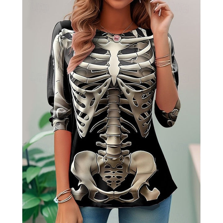 tunic top featuring 3D skeleton bone design in tan and black