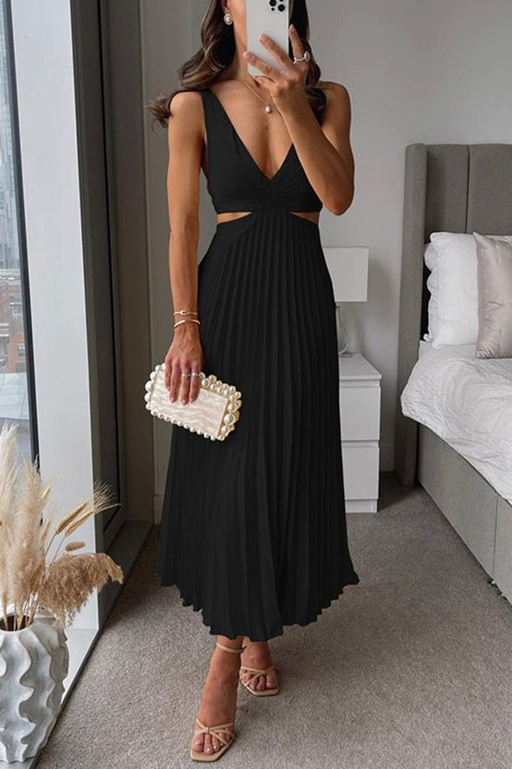 Black pleated maxi dress featuring V-neck and side cutout waist