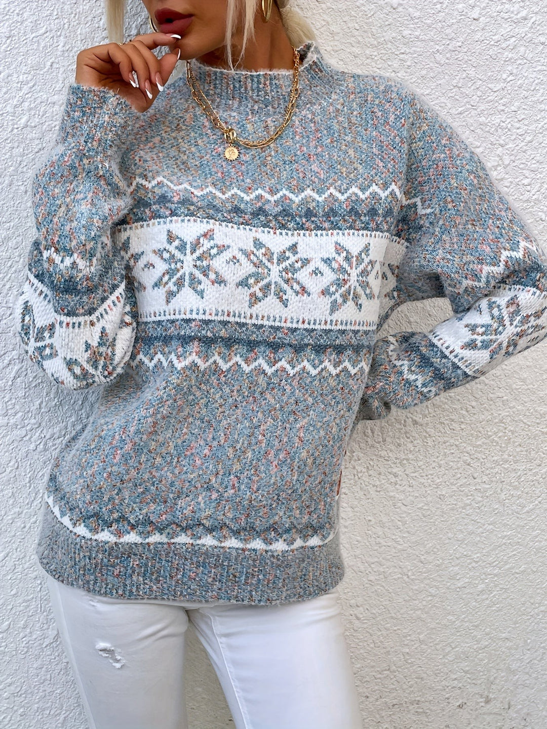 Blue fair isle sweater with snowflake trim and mock turtleneck