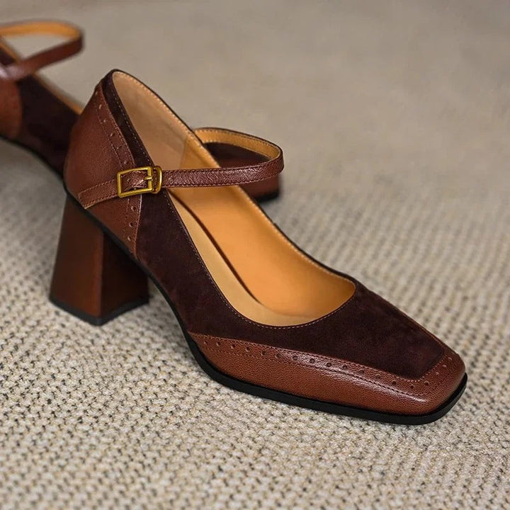 brown leather and suede pumps showing brogue detailing and chunky heel