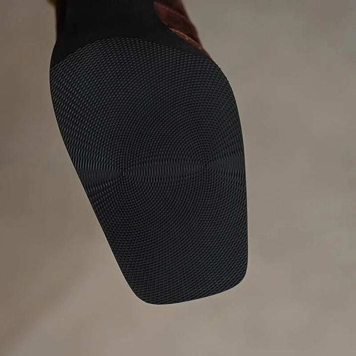 textured black rubber sole on chunky block heel pump