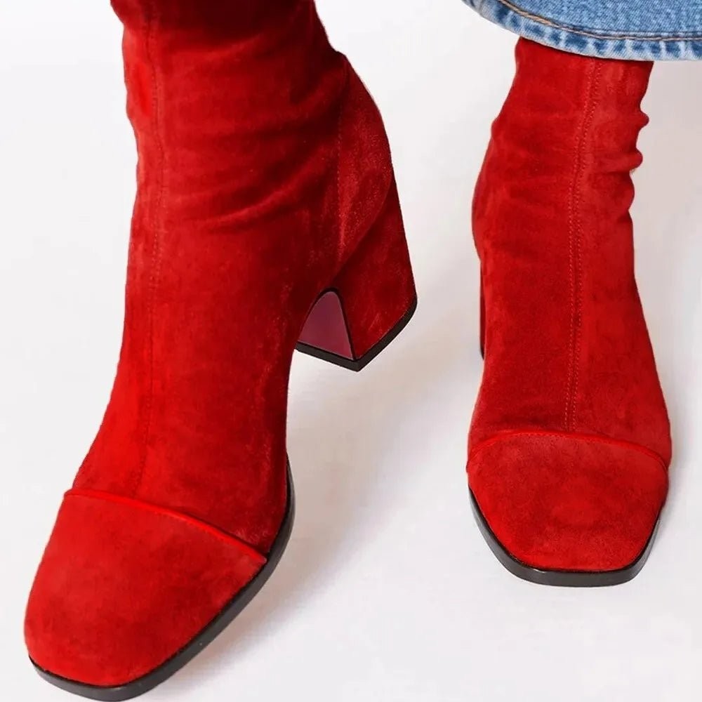 red suede ankle boots featuring block heel and square toe