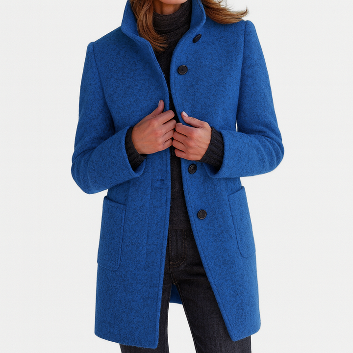 cobalt blue wool coat featuring stand collar and front buttons