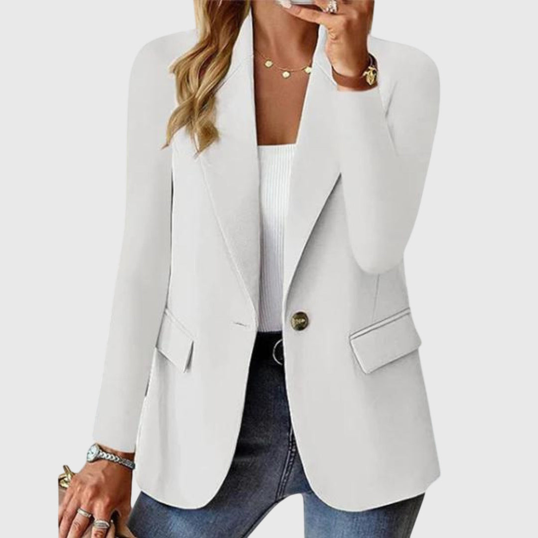 White structured blazer with front flap pockets and single-button closure