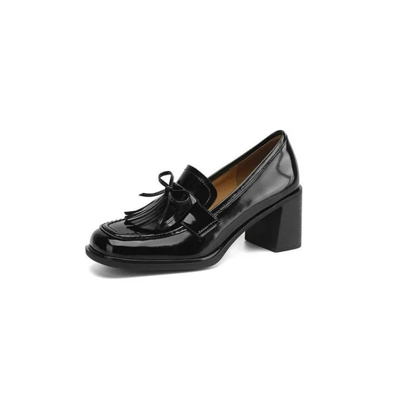 black patent tassel loafer pump with round toe and stacked block heel