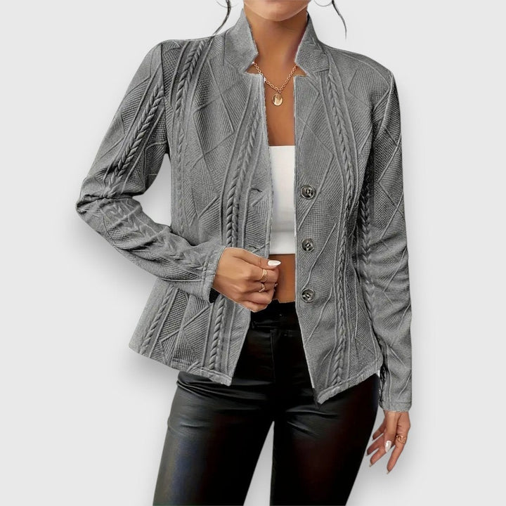 gray cable-knit textured jacket with button closure, front view