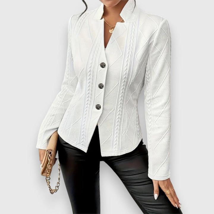 white cable-knit textured jacket with button front, close-up view