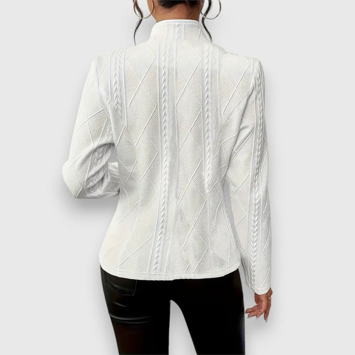 white cable-knit fitted jacket with mock neck, back view