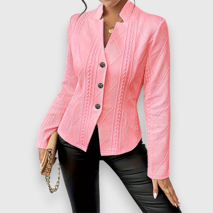 pink cable-knit textured jacket with button front, side view