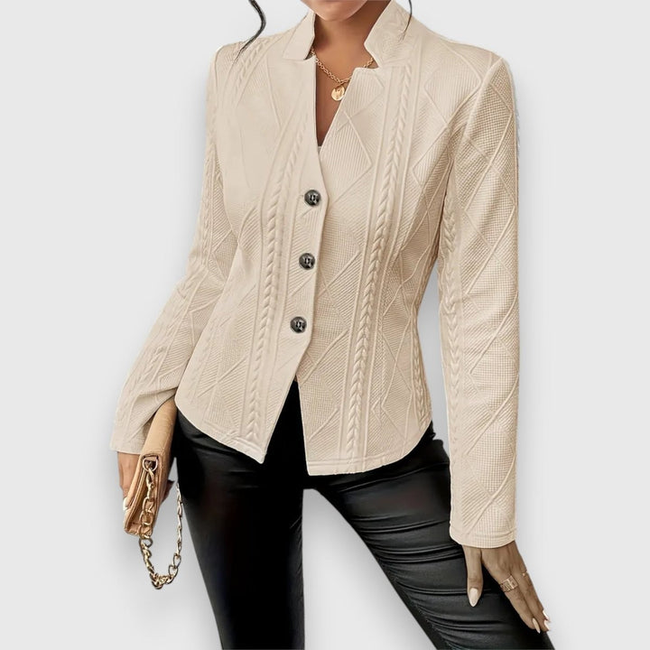 beige cable-knit textured jacket with button closure, front view